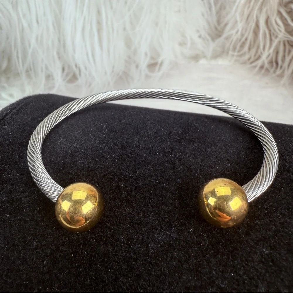 Pretty silvertone and goldtone, twisted cuff bracelet